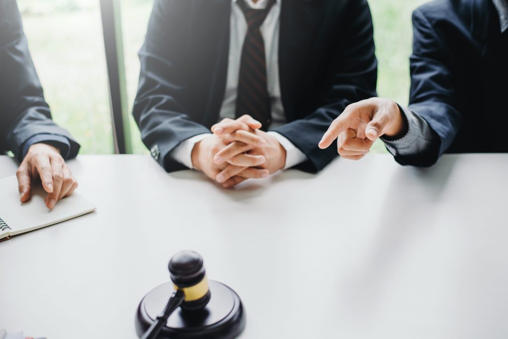 businessmen-and-lawyers-meeting-and-discuss-lawsui-2026-01-08-06-20-37-utc (1)
