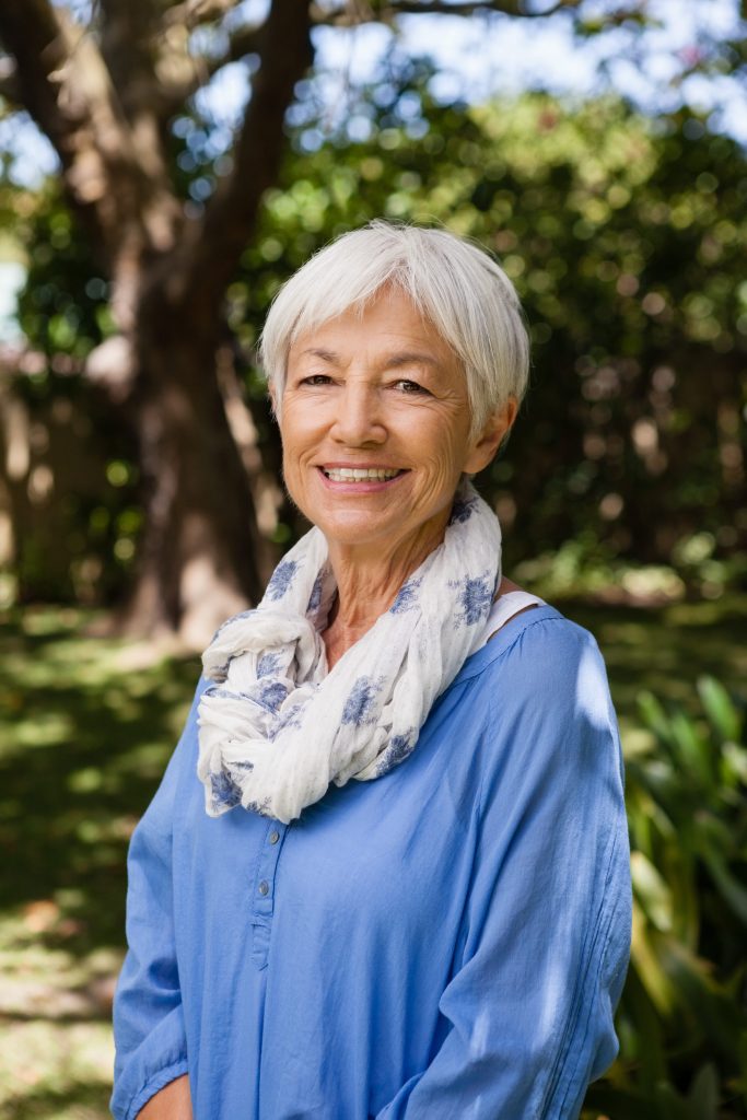 portrait-of-smiling-senior-woman-standing-in-backy-2026-03-26-11-50-47-utc (1)